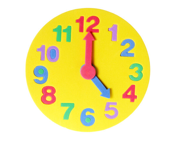 Toy Clock on White Background